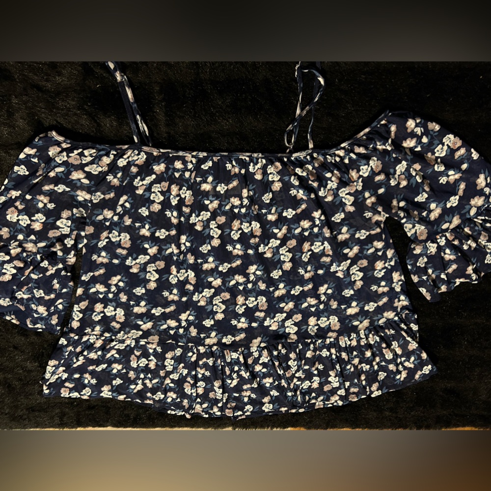 Ladies shirt size XL shirt is true to size and is sheer material but not seethro